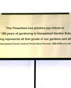 Willifield Way flowerbed centenary plaques