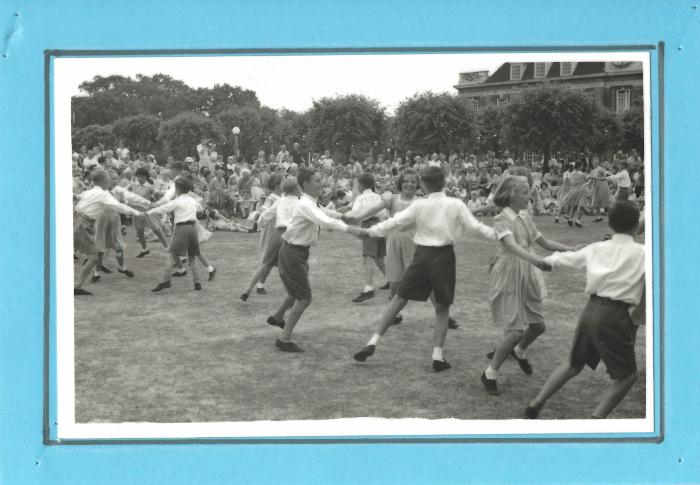 Brookland pupils on Central Square (circle dancing between the churches). Date unknown but probably 1955