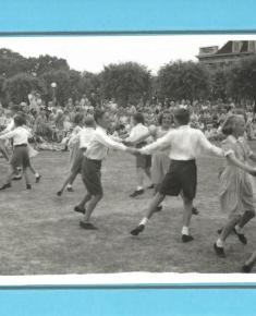 Brookland pupils on Central Square (circle dancing between the churches). Date unknown but probably 1955