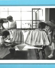 Dress-making class, labelled 1955